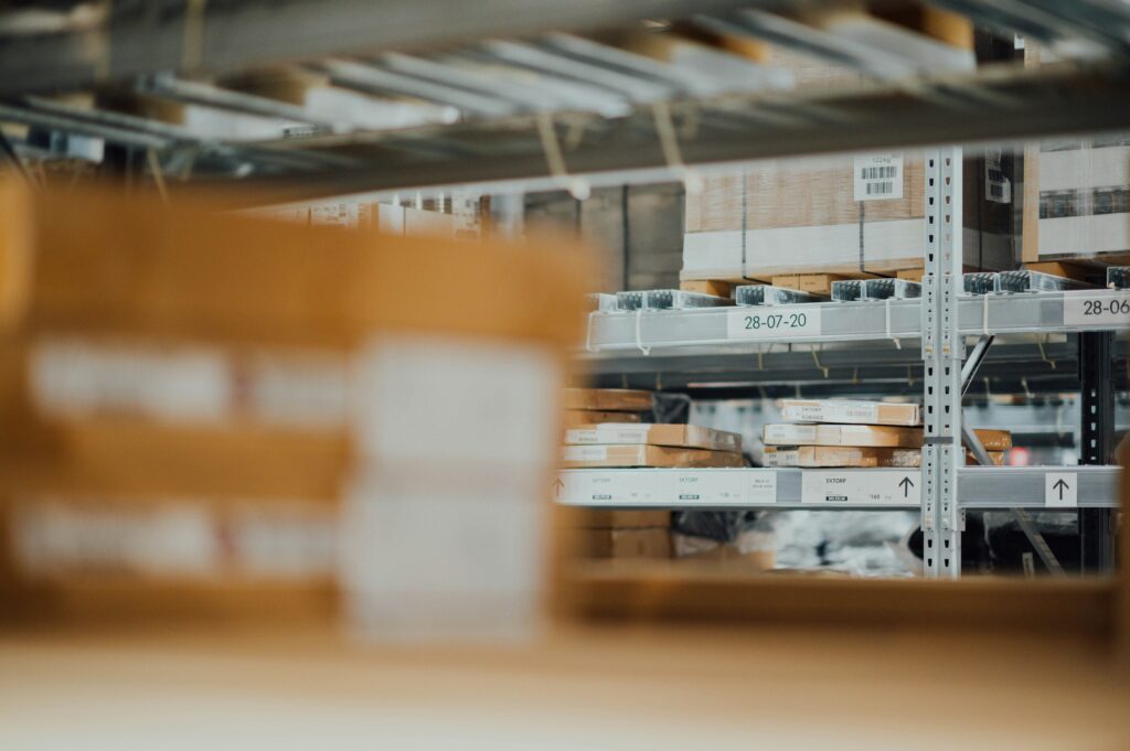 Cases of packaged consumer goods staged for distribution